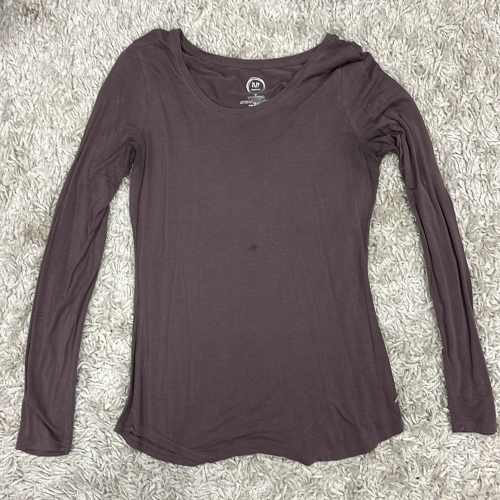 Purple long sleeve Maurice’s shirt. Some signs of wear shown in photos.